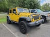 2 thumbnail image of  2011 Jeep Wrangler Unlimited Sport