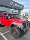 2 thumbnail image of  2014 Jeep Wrangler Unlimited Sport