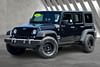 2 thumbnail image of  2015 Jeep Wrangler Unlimited Sport