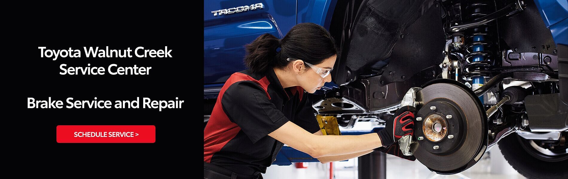 Toyota Walnut Creek Service Center Brake Service and Repair - a woman checking brakes