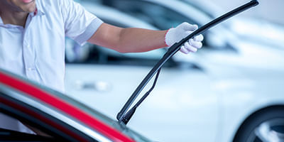 Mechanic Installing Wiper Blade