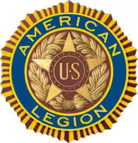 Official emblem of The American Legion, featuring a central gold star with 'US' on a blue background with laurel wreaths, encircled by 'AMERICAN LEGION'.