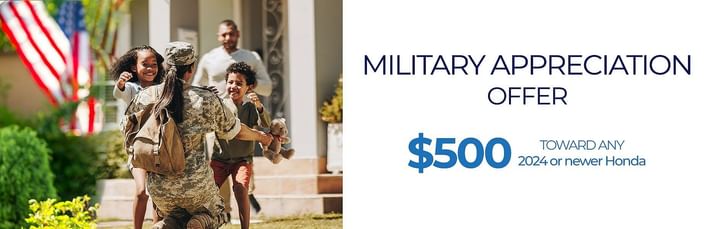 Woman in military uniform with a backpack returning home and embracing two joyful children, with an American flag in the background. Text on the right reads: 'Military Appreciation Offer – $500 toward any 2024 or newer Honda.'