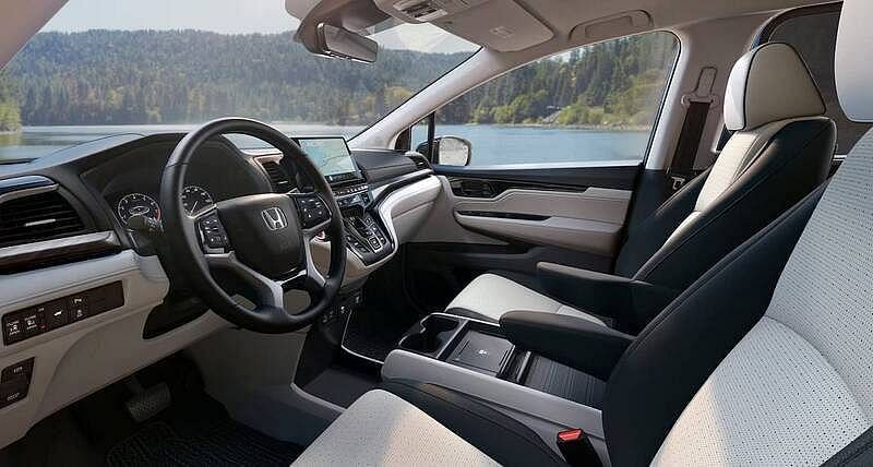 The 2026 Honda Odyssey Elite Gray interior cabin view from driver side