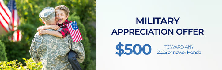 A soldier in camouflage embraces a joyful child holding a U.S. flag. Text reads "Military Appreciation Offer $500 toward any 2025 or newer Honda.