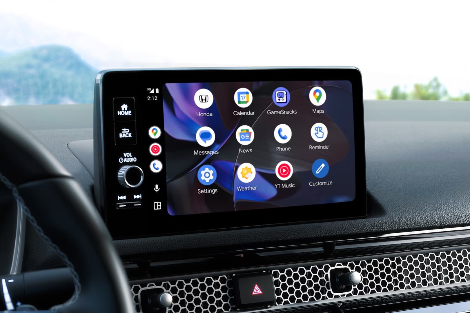 Close-up of a 2026 Honda Civic Sedan Hybrid dashboard infotainment screen displaying colorful app icons for navigation, music, and settings against a sleek background.