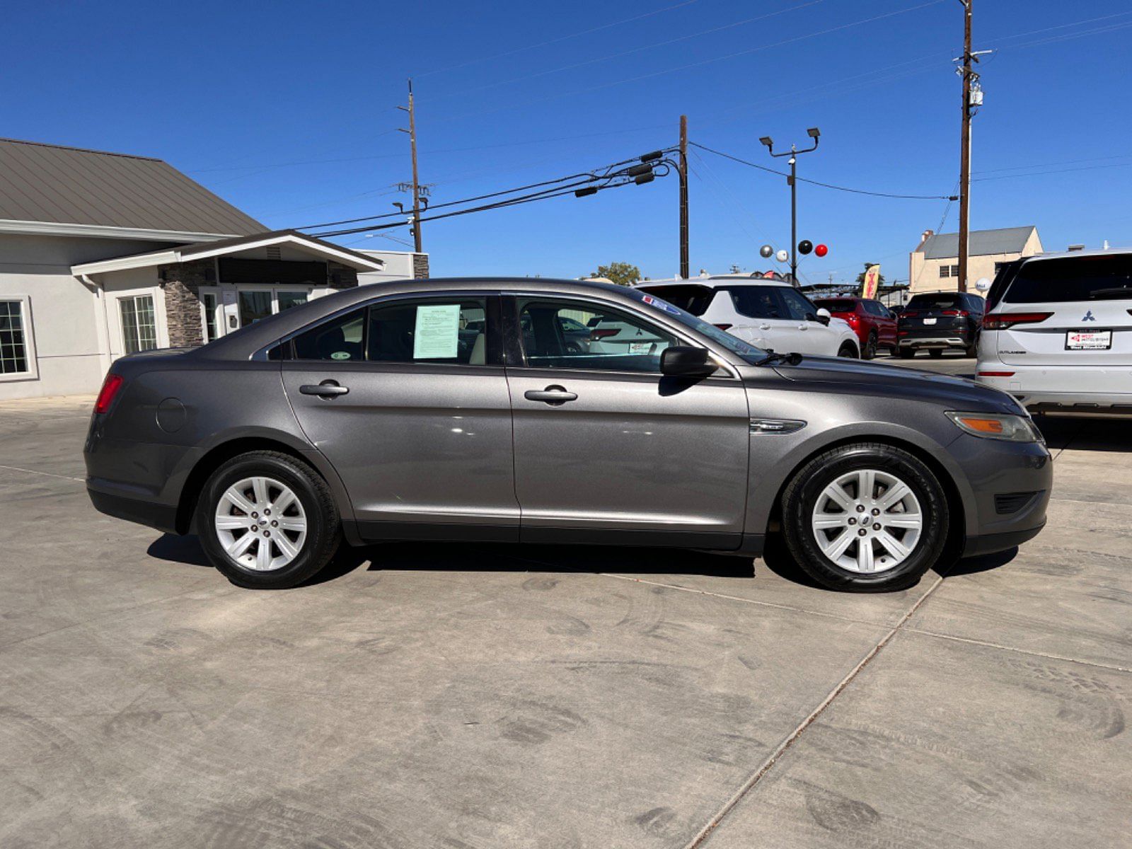 Used 2012 Ford Taurus SE with VIN 1FAHP2DW0CG140012 for sale in Orland, CA