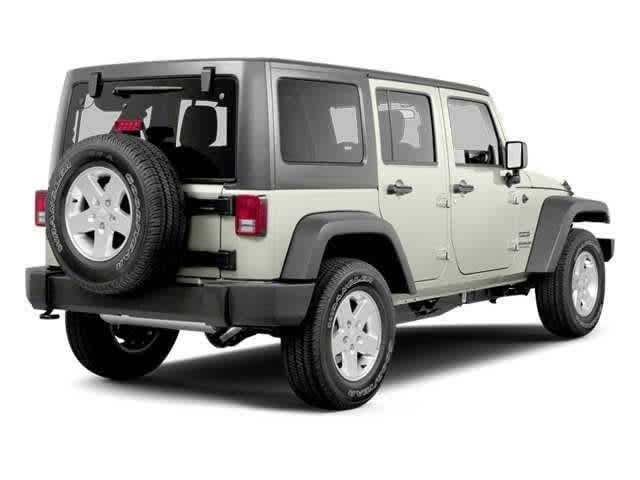 2 thumbnail image of  2013 Jeep Wrangler Unlimited Sport
