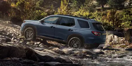 2026 Honda Pilot TrailSport Shown in Smoke Blue Pearl with Honda Genuine Accessories.
