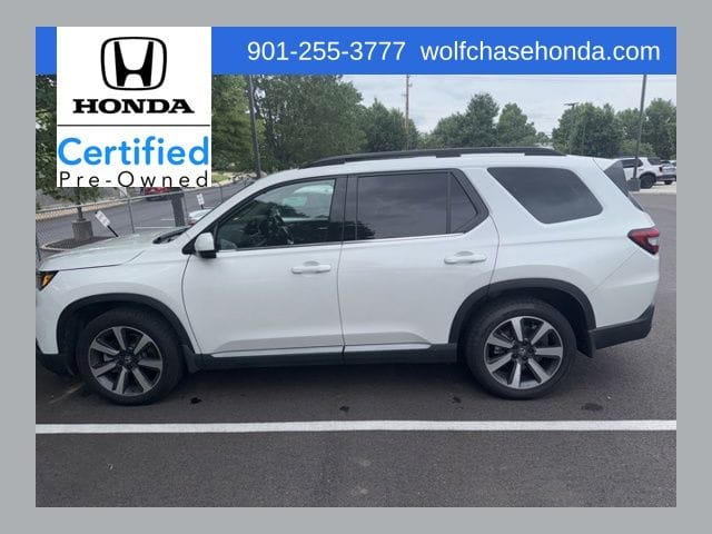 1 placeholder image of  2023 Honda Pilot Elite