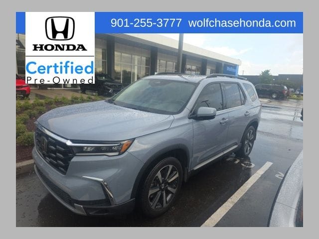 1 placeholder image of  2023 Honda Pilot Elite